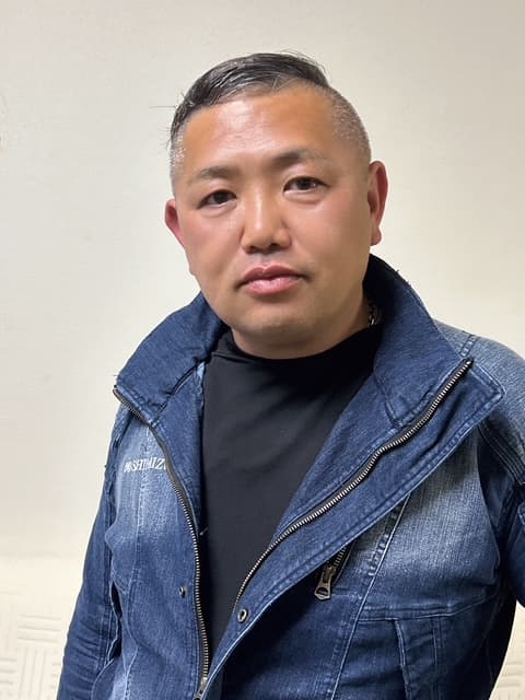 作業着姿の代表 清水
